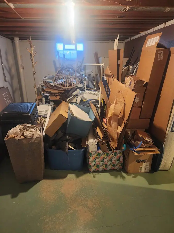 Roll-off dumpster container at job site for 8 Yard Dumpster Rental in Nitro